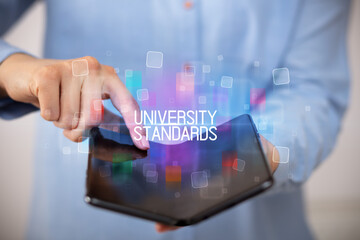Young man holding a foldable smartphone