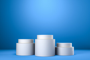Round product display podium. Minimal white geometric shape stage scene on blue background. 3d rendering.