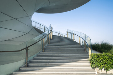 An artistic outdoor spiral staircase