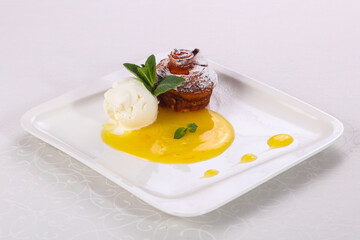 Tasty hot muffin with ice cream