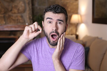 Young man losing a tooth