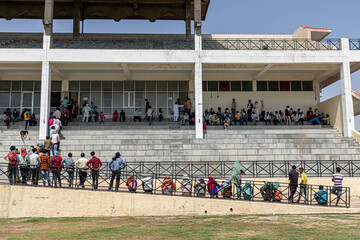 people maintain social distance during lock down in india.