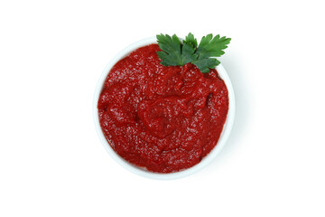 Bowl of tomato paste isolated on white background