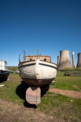 Old fashioned obsolete boat in a salvage yard © simonXT2