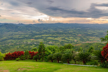 View from a large mountain to a valley with a lake in the Dominican Republic