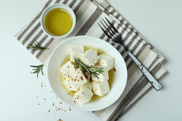 Concept of tasty food with feta cheese on white background