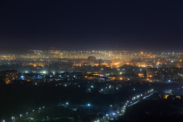 Fototapeta na wymiar Smog in a Night City in Eastern Europe
