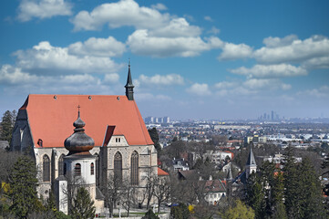 Mödling city in Lower Austria and Vienna in the distance cityscape