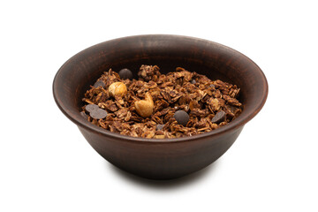 Chocolate granola cereal with nuts in a bowl background.