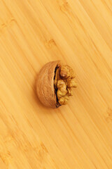 half-opened walnut lies on the table. Top view