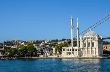 Fototapeta na wymiar A beautiful view from Bosphorus on historical Ortakoy Mosque, Istanbul, Turkey