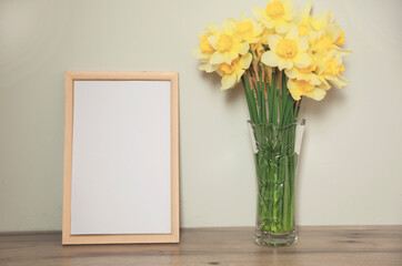 yellow flowers and photo frame