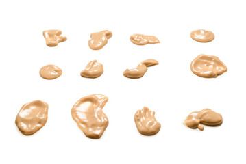 Mushroom sauce splashes isolated on white background.