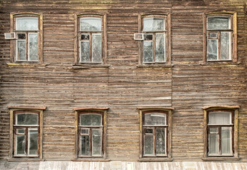 Nizhny Novgorod a dilapidated wooden residential building with eight windows