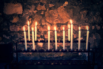 Rack Of Prayer Candles In Saint Bartholomew The Great Church, London