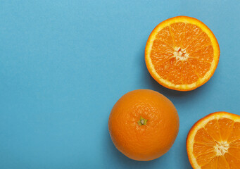Orange fruit or orange on a blue background.