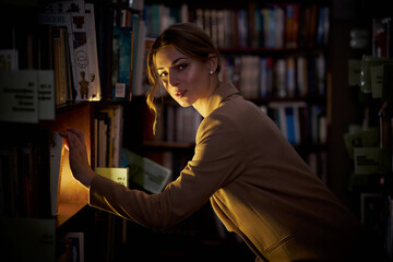 portrait of a woman in a library