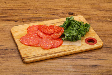 Italian spycy pepperoni sausage slices