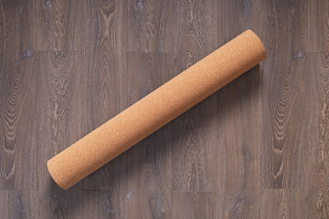 Cork roll and laminate floor wood background texture. Wooden laminate floor plank