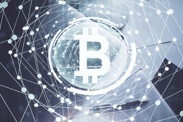 Double exposure of blockchain theme hologram over table with phone. Top view. Crypto technology...