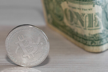 bitcoin coin on a dollar background