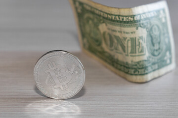 bitcoin coin on a dollar background