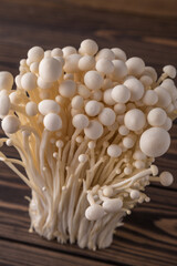 Fresh Enoki mushrooms  with selected focus.Enoki, also known as velvet shank, is a species of edible mushroom in the family Physalacriaceae.