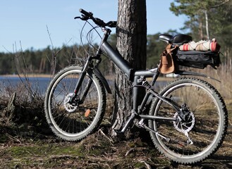 A folding mountain bike on the lake shore