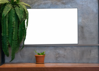 Empty wooden table with image blank mockup on the wall