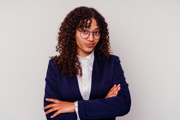 Young business mixed race woman isolated on white background unhappy looking in camera with sarcastic expression.