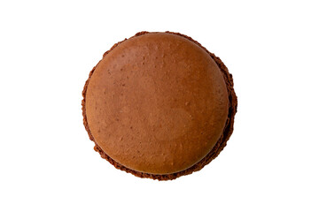 One brown chocolate macaron cookie isolated on a white background.