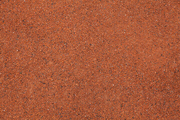 Clay background, surface tennis court, close-up. Sports design element, copy space
