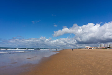 panoramic view of the Punta umbria beaach, Huelva  on a sunny day with clouds
