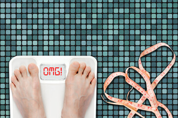 Woman on Bathroom Scale Displaying OMG Message