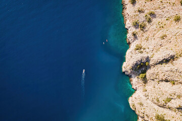 Aerial view of motor boat with White Trace Of Speed Boat Sailing Toward in sea. Holiday Tourism...
