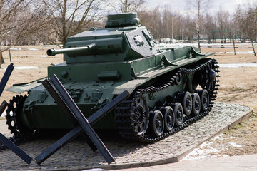 Fototapeta na wymiar Abandoned war german tanks in museum. Urbex exploration in german countryside.