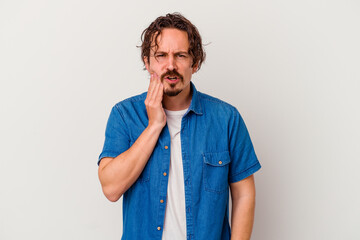 Young caucasian man isolated on white background having a strong teeth pain, molar ache.