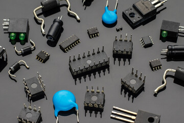 Various electronic components on a black background