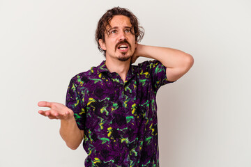 Young caucasian man isolated on white background screaming with rage.