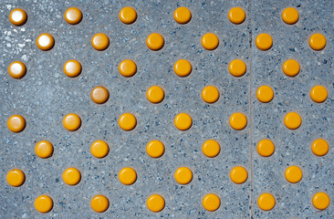 Yellow circles, blind path, sidewalk, pathway, city life, roadside