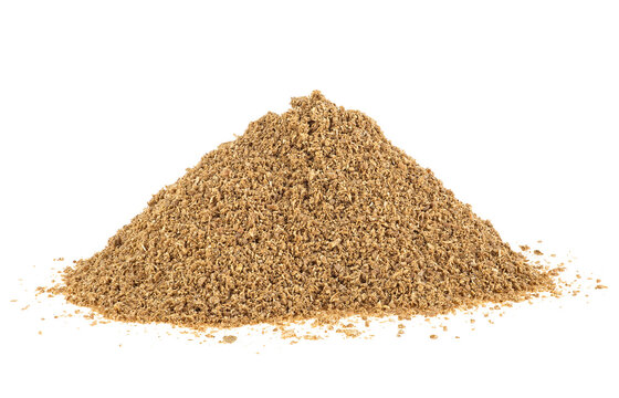 Pile of organic coriander powder isolated on a white background. Coriander spice powder.