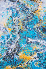 Liquid marble, fluid art, stained background, blue alcohol ink, creative wallpaper with paint spots. Texture modern painting. Sea waves effect, water flow.