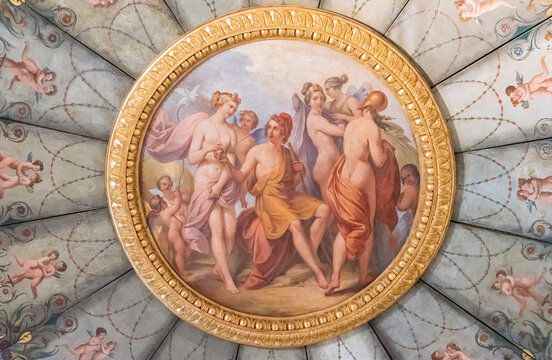 Close-up on colorful old fresco representing a group of young and beautiful naked women