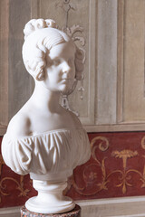 Old marble bust of young girl