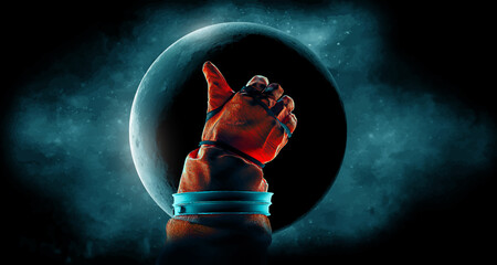 Astronaut shows like on the background of the moon © Yevheniia