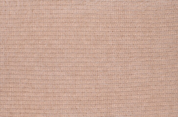 Fototapeta na wymiar Beige knitted fabric as background