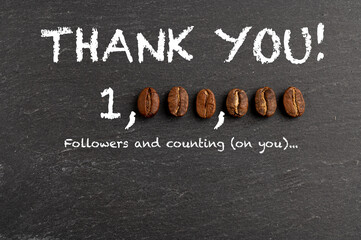 Thank you sign  one million followers on blackboard. Zero numbers represented with coffee beans