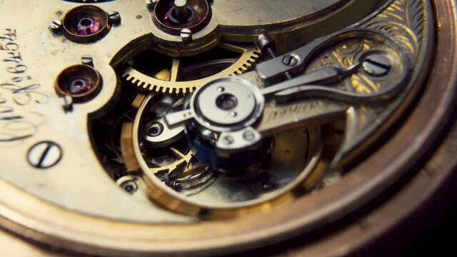 Rotating gears inside a vintage watch mechanism