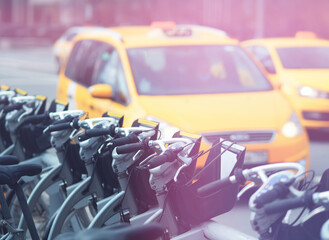 Bicycle vs taxi parking transportation backdrop