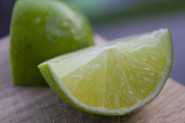 Lemon slices on a wooden cutting board